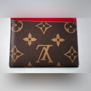 Zoe Wallet Monogram Canvas and Leather wallet.